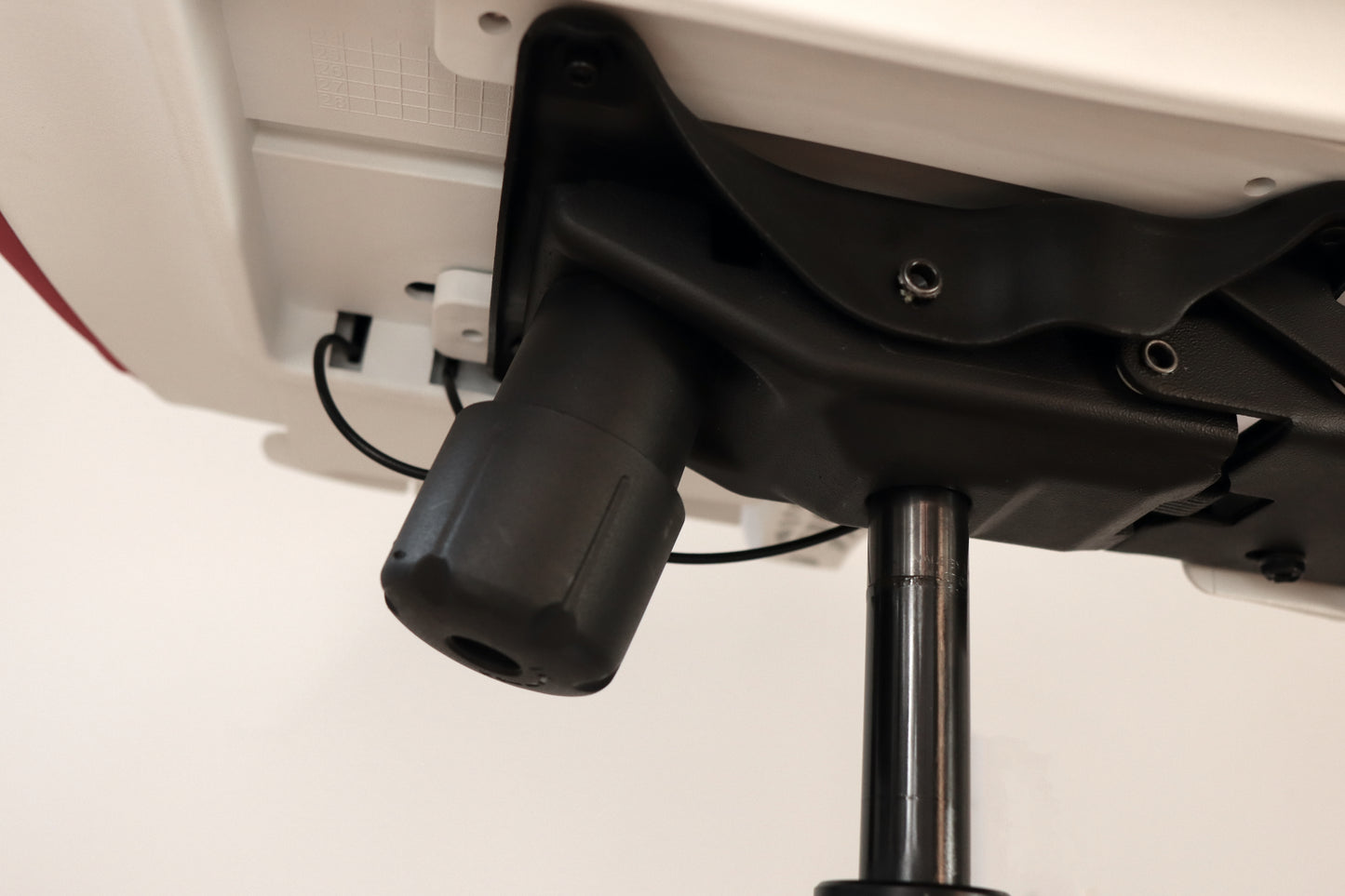 Office chair tilt resistance strength adjustment knob closeup