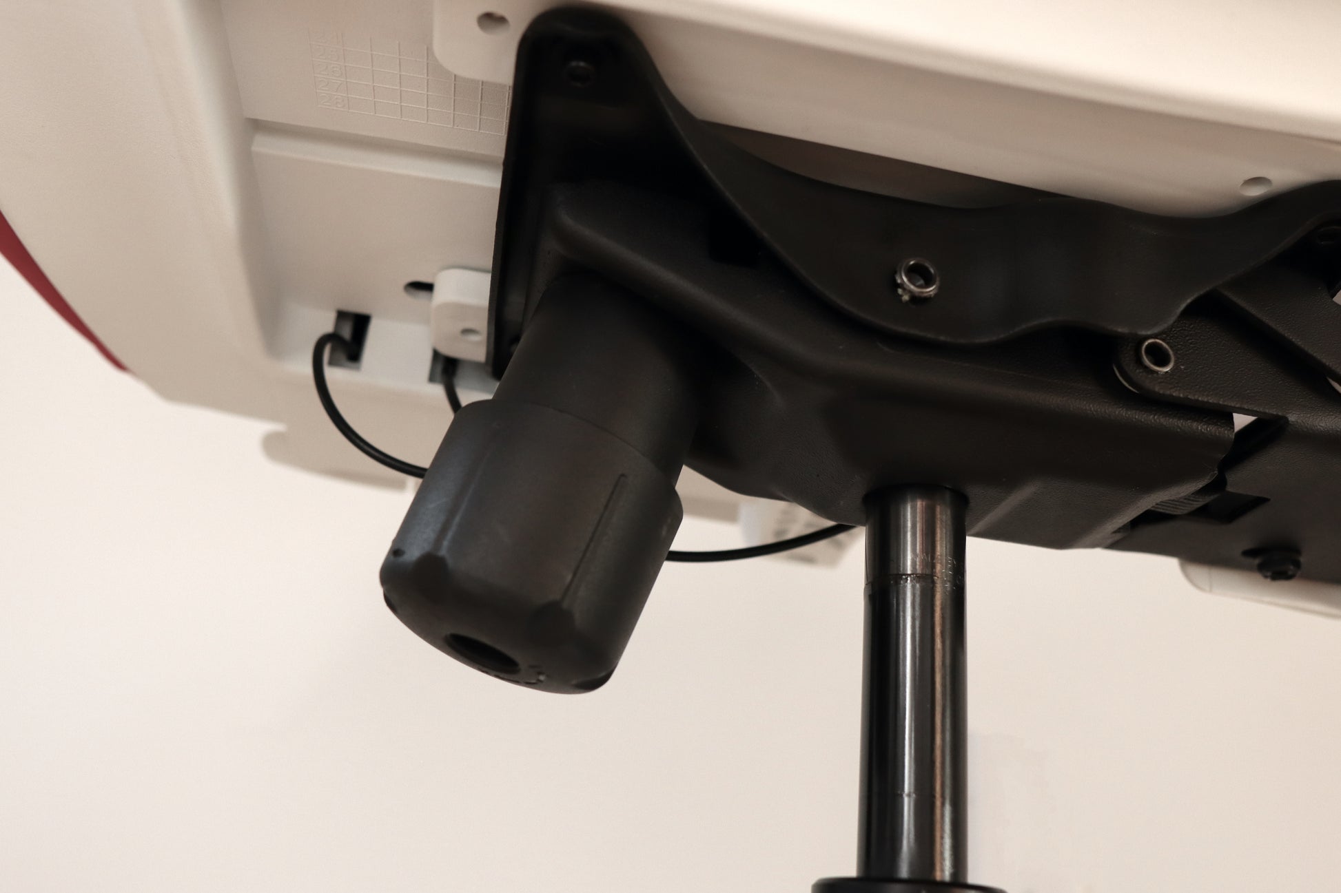 Office chair tilt resistance strength adjustment knob closeup