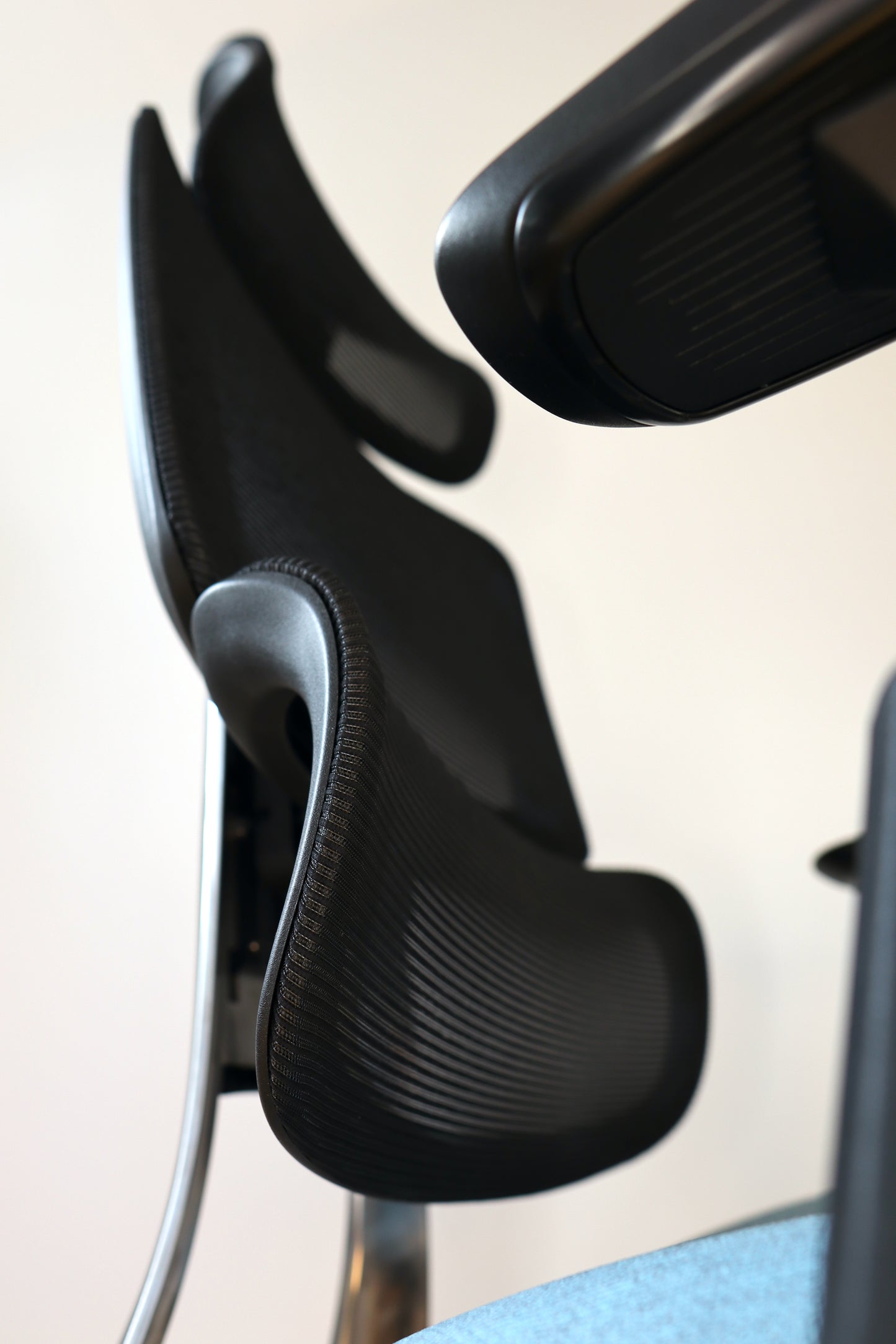 Closeup of Triton office chair height adjustable backrest